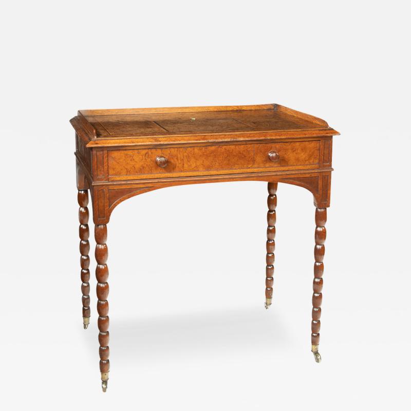 An oak and pollard oak writing table attributed to George Bullock