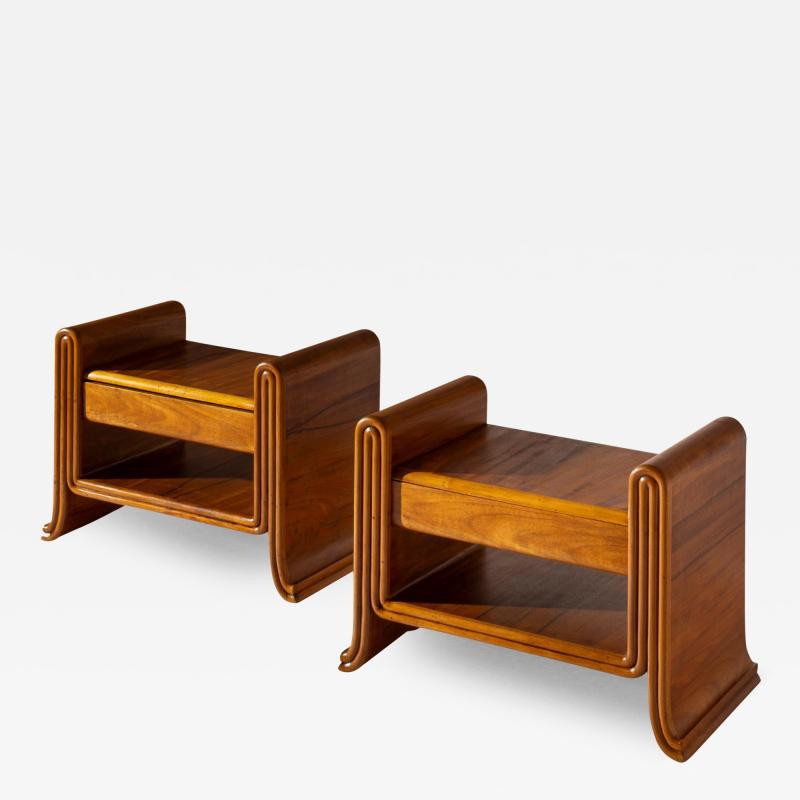 An organic pair of bedside tables made of teak Italy 1930s