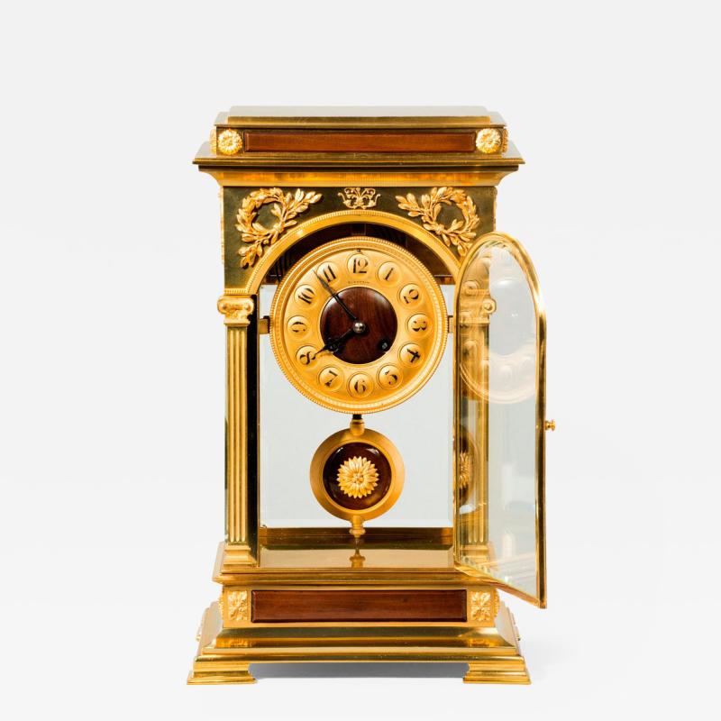 An unusual and superb quality rectangular four glass ormolu mantel clock