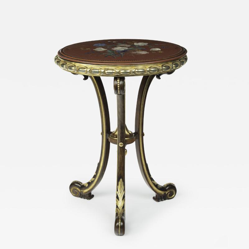 An unusual slate topped parcel gilt walnut table by William Turner Son