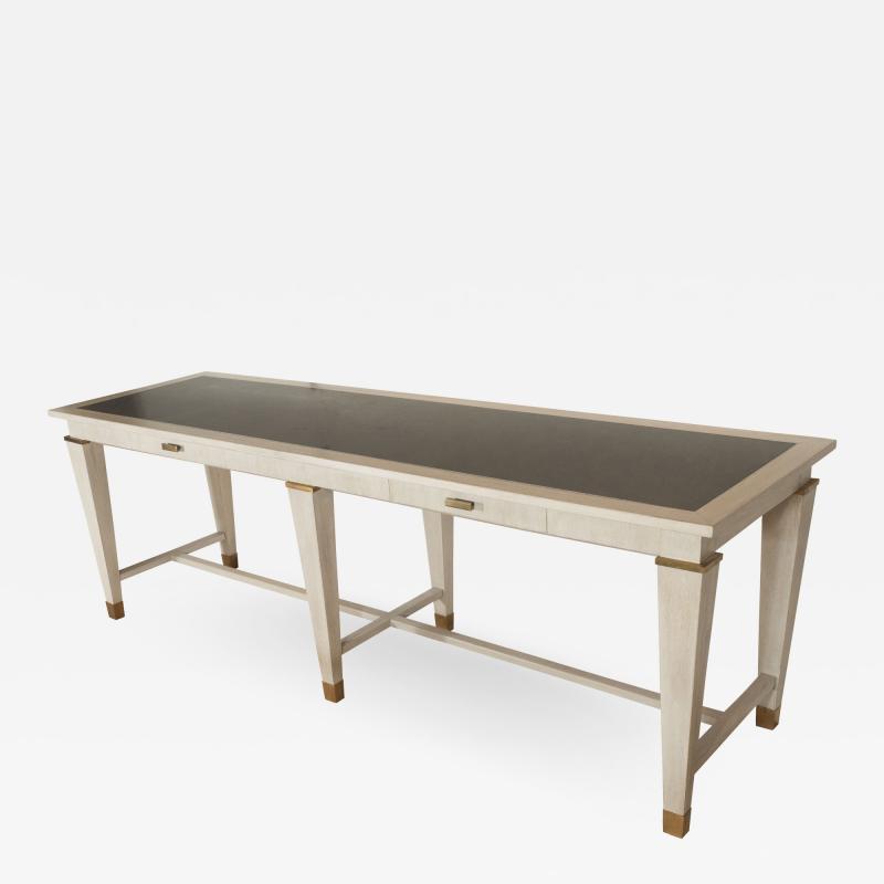 Andr Arbus LARGE TABLE BY ANDRE ARBUS IN CERUSED OAK W STONE TOP AND BRONZE DETAILS