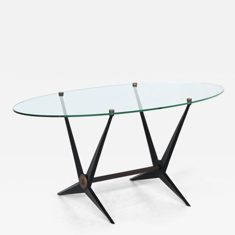 Angelo Ostuni Angelo Ostuni oval coffee table metal and glass Italy 1950