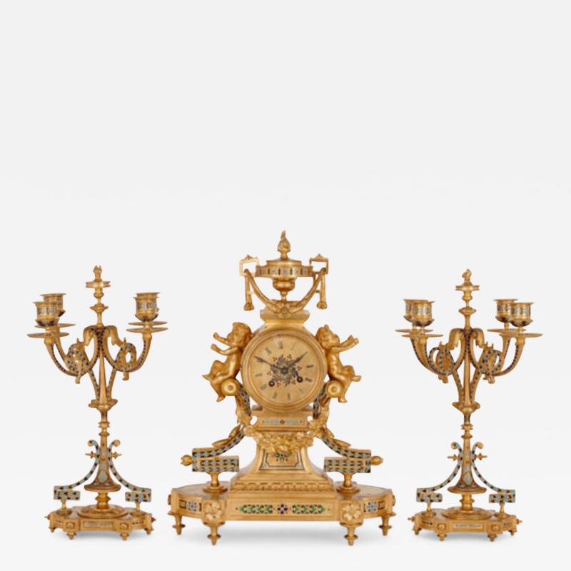 Antique French eclectic style enamel and gilt bronze clock set