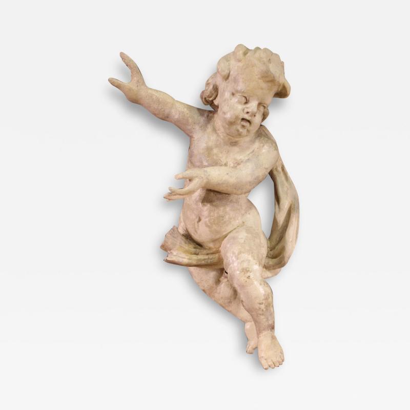 Antique Italian wooden sculpture of a cherub from the 18th century