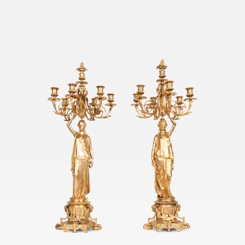 Antique Pair of Bronze Six Light Candelabra with Flame Finials