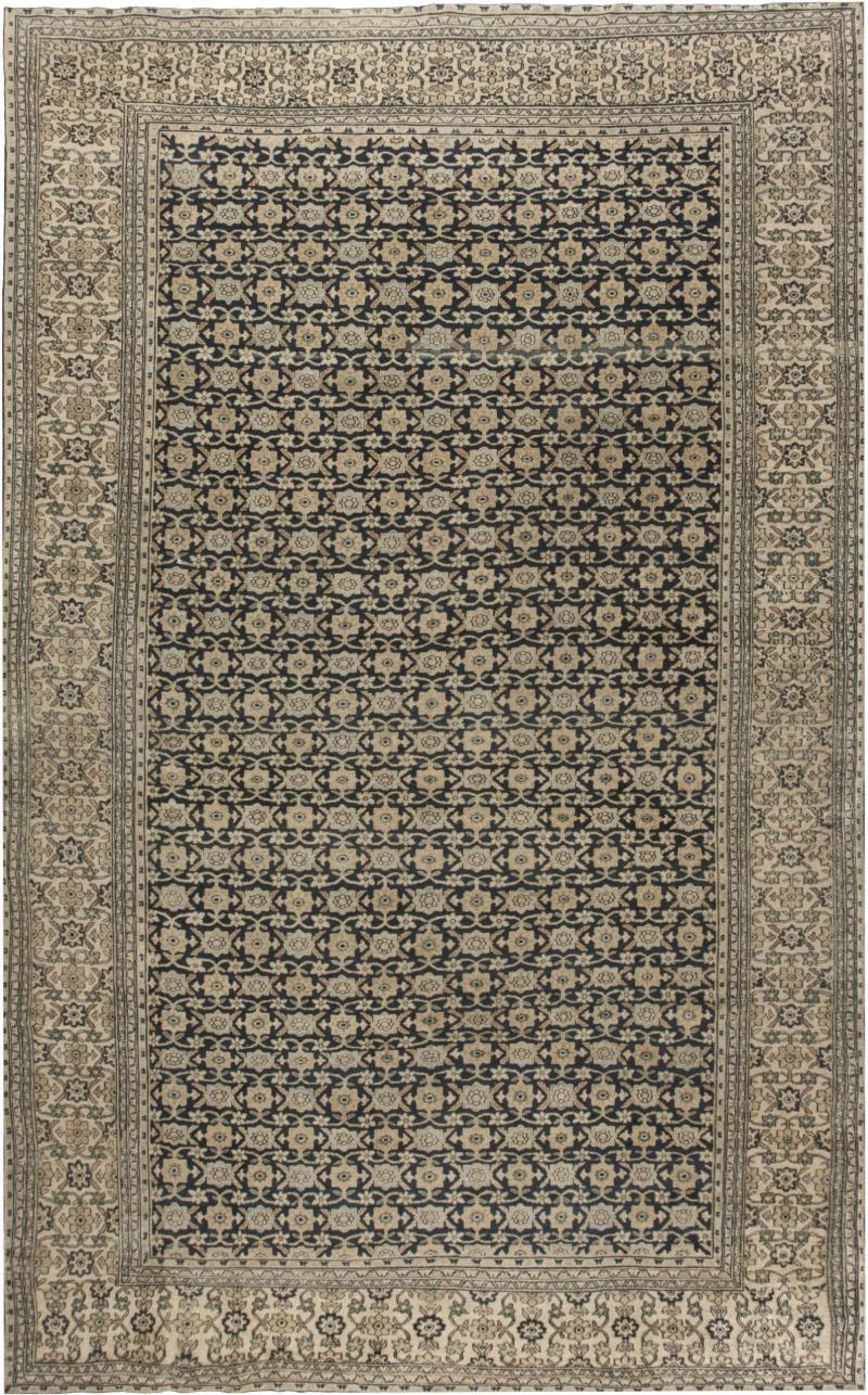 Antique Persian Meshad Botanic Beige Brown and Black Handwoven Wool Rug