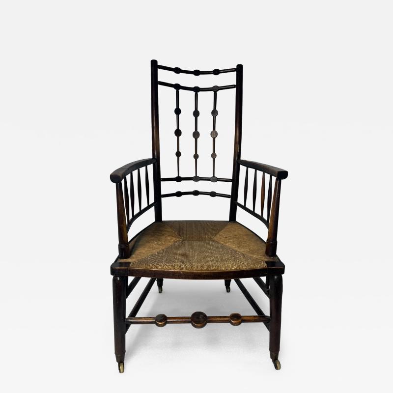 Antique Victorian Spindle Back Armchair with Woven Rush Seat Casters