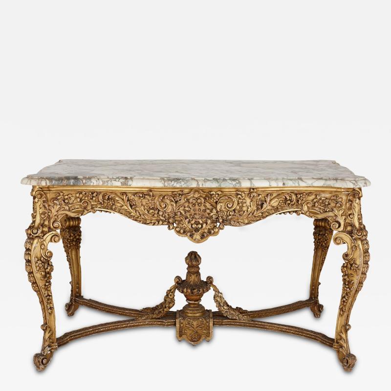 Antique marble topped R gence style giltwood centre table
