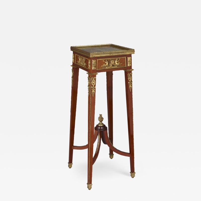 Antique ormolu and mounted mahogany stand with onyx top