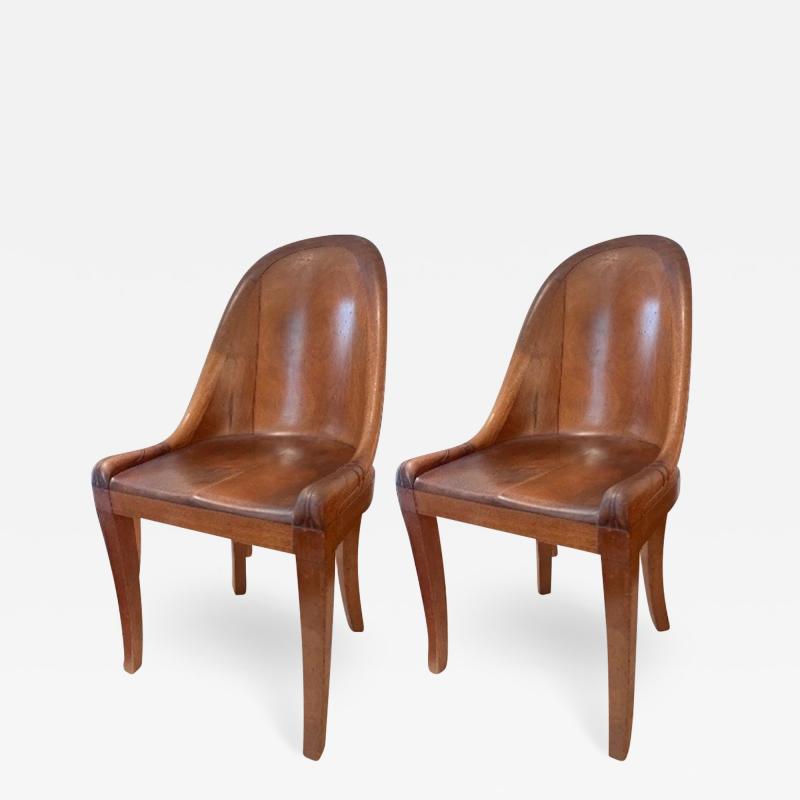 Armond Albert Rateau A A Rateau style forties empire revival pair of stunning carved chairs