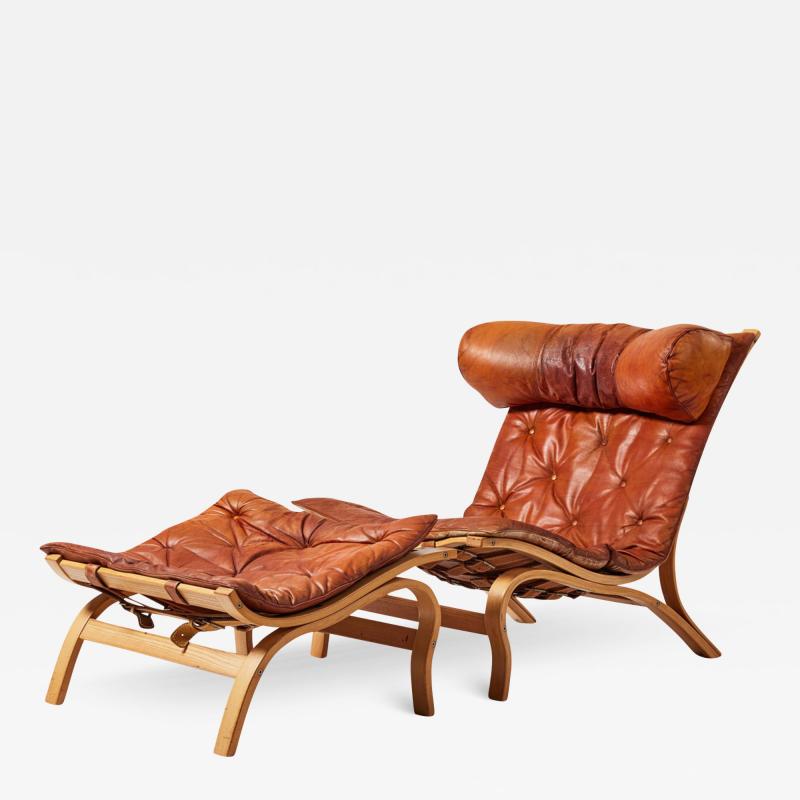 Arne Norell 1960s Arne Norell leather Scandi lounge chair ottoman