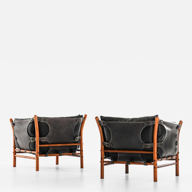 Arne Norell Pair of Mid Century Easy Chairs in Beech Brass Leather by Arne Norell 1960s