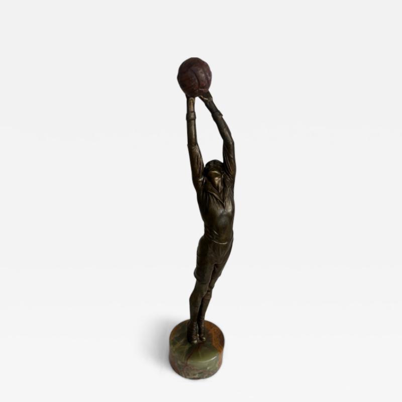 Art Deco bronze goalie soccer player standing on a round green onyx base