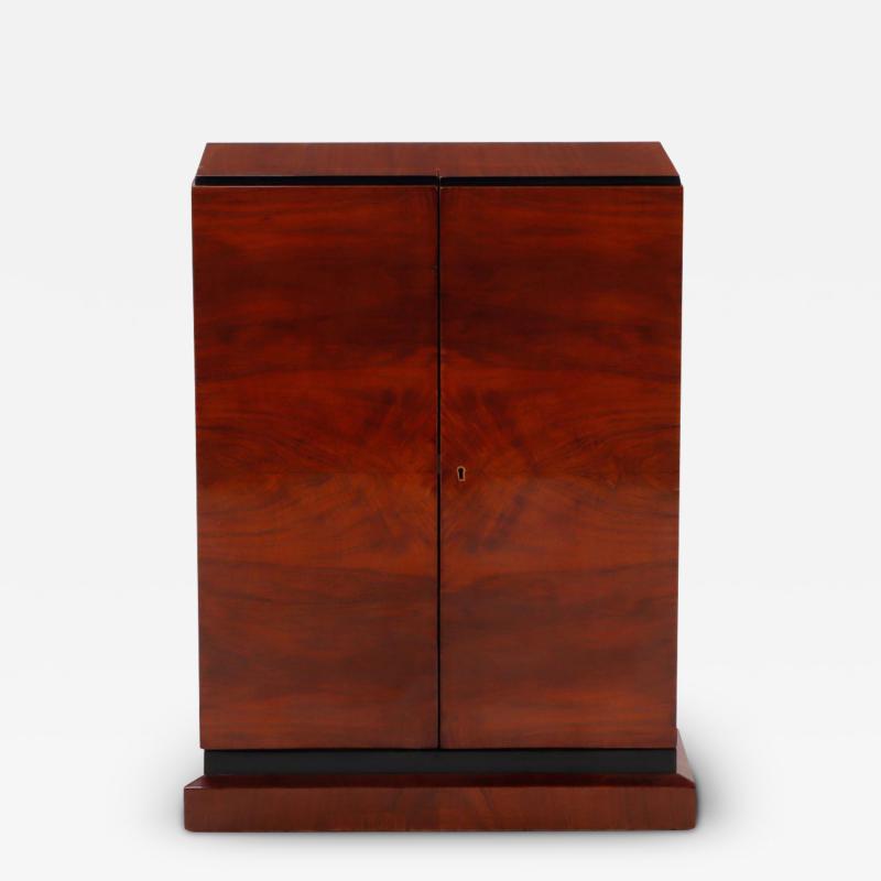 Art Deco walnut two door bar cabinet with ebonized details C 1940 