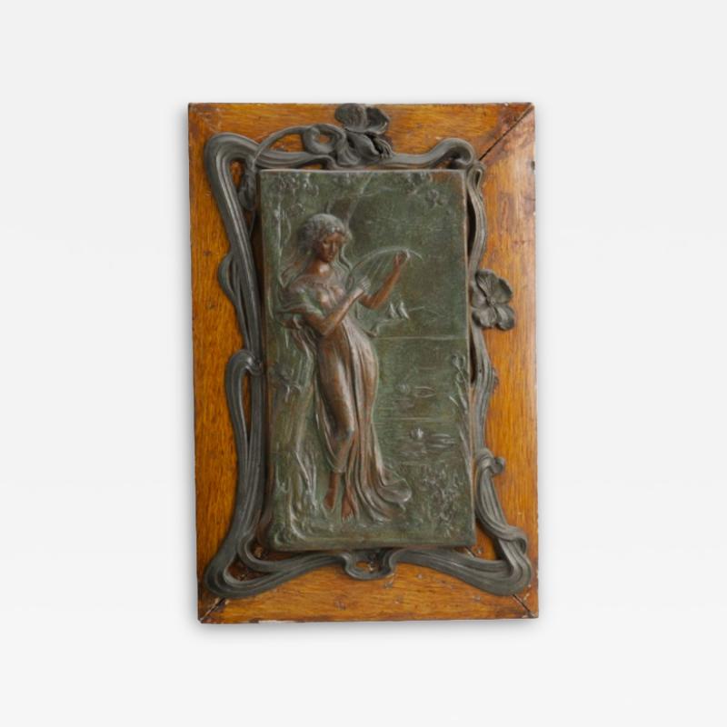 Art Nouveau Metal and Oak Figural Wall Plaque
