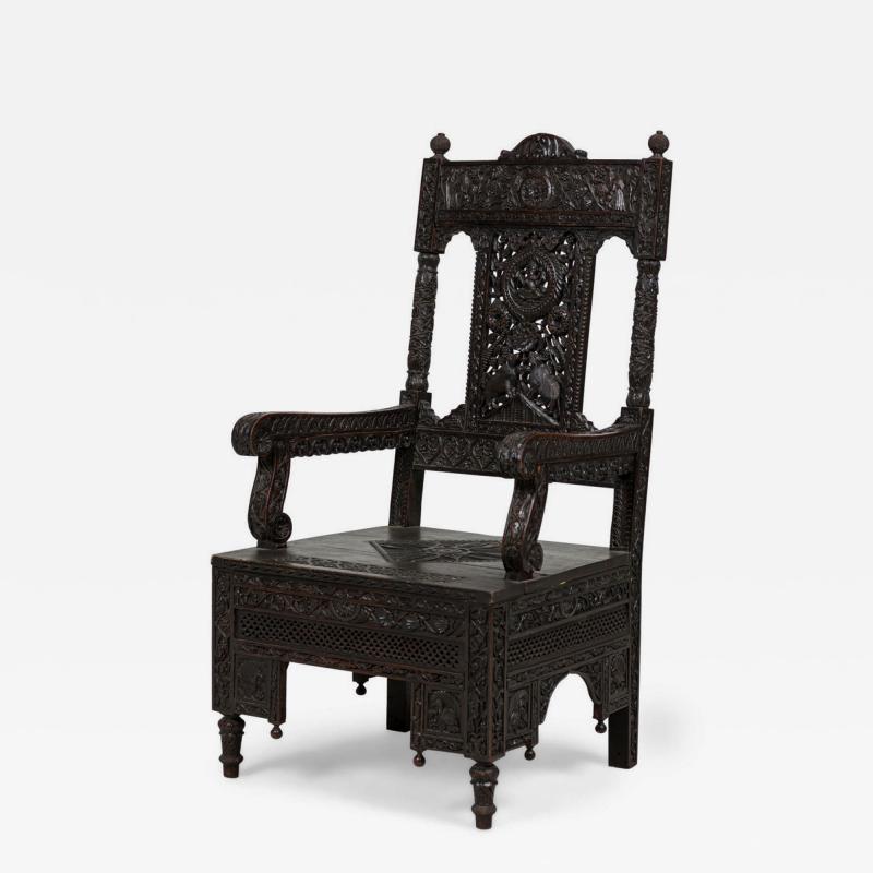 Asian Burmese Ebonized Arm Chair