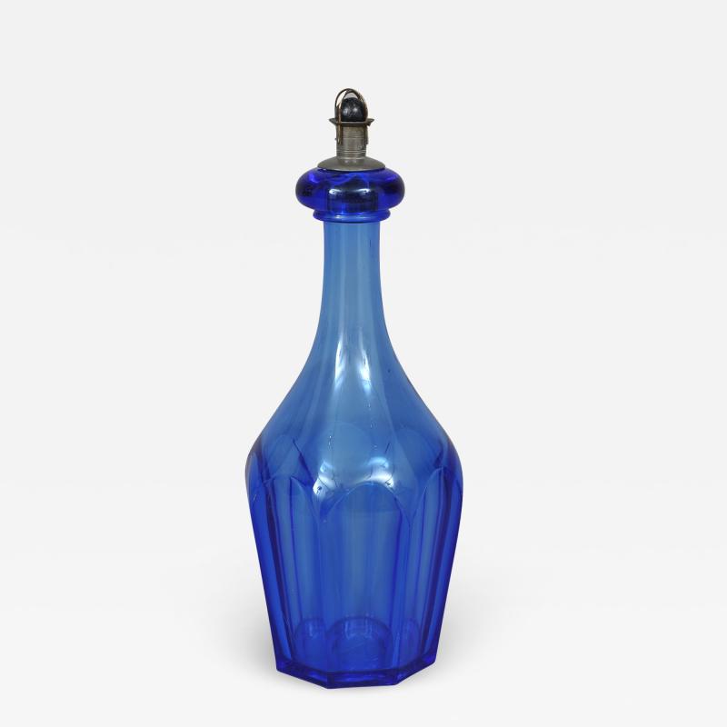 BLOWN BOTTLE WITH PEWTER STOPPER