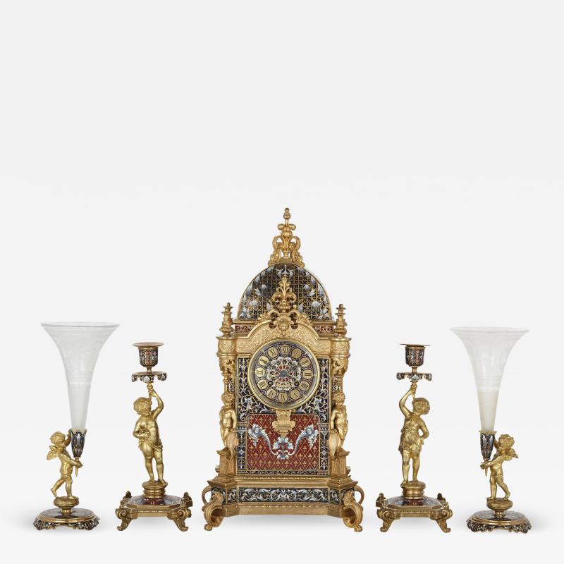 Belle poque period gilt bronze and enamel clock set
