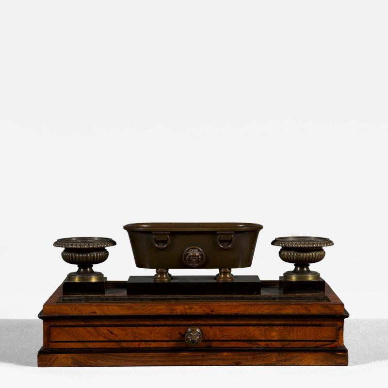 Benjamin Lewis Vulliamy A Regency inkstand in the form of an ancient Roman labrum flanked by urns