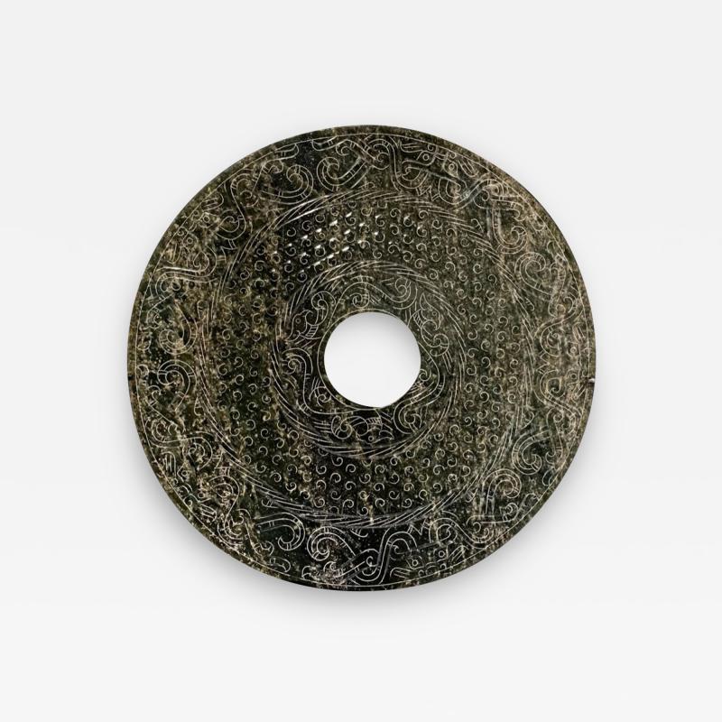 Bi Disc with Incised Imperial Decorations