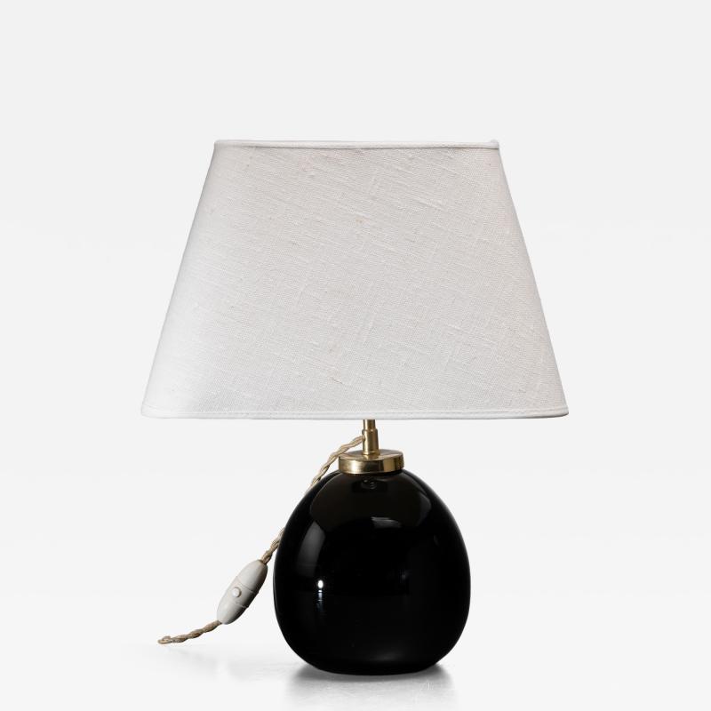 Black glass globe table lamp
