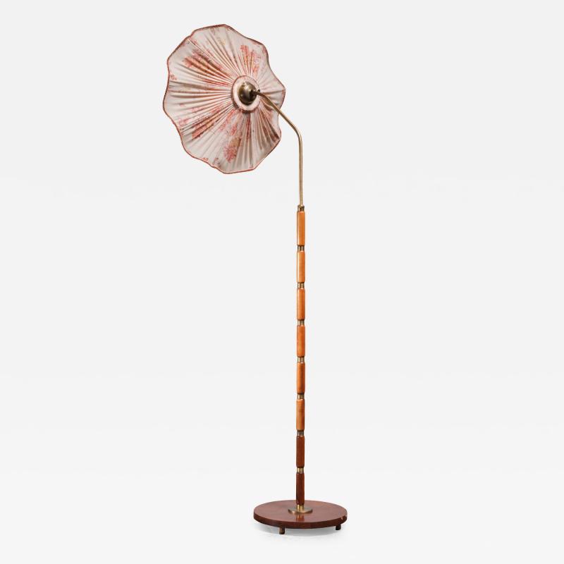 Brass and wood floor lamp