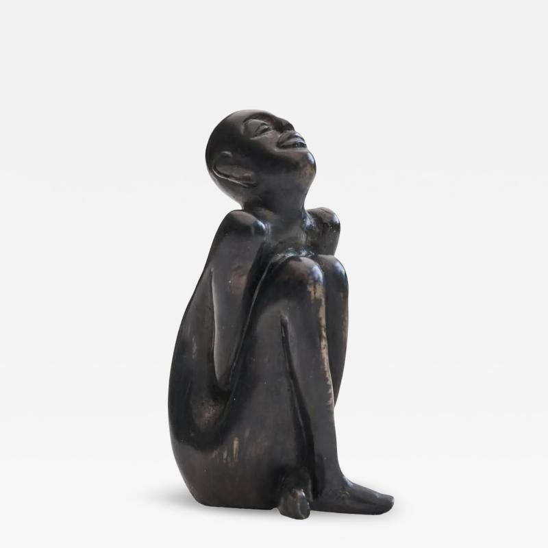 Bronze Sculpture of a Sitting Man
