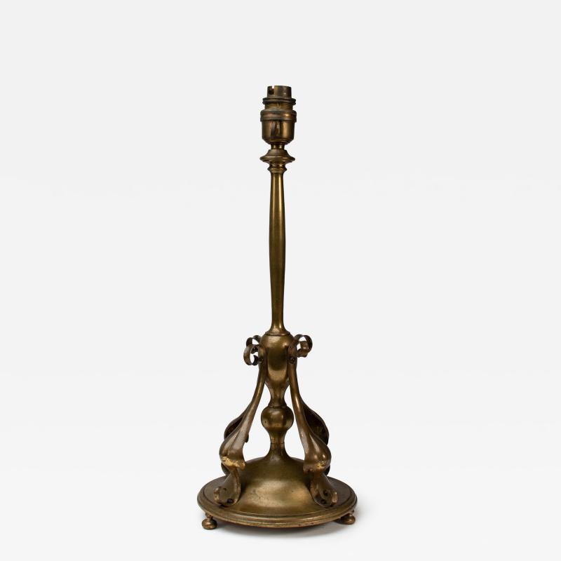 C F A Voysey An Arts Crafts Brass Table Lamp in the Style of C F A Voysey