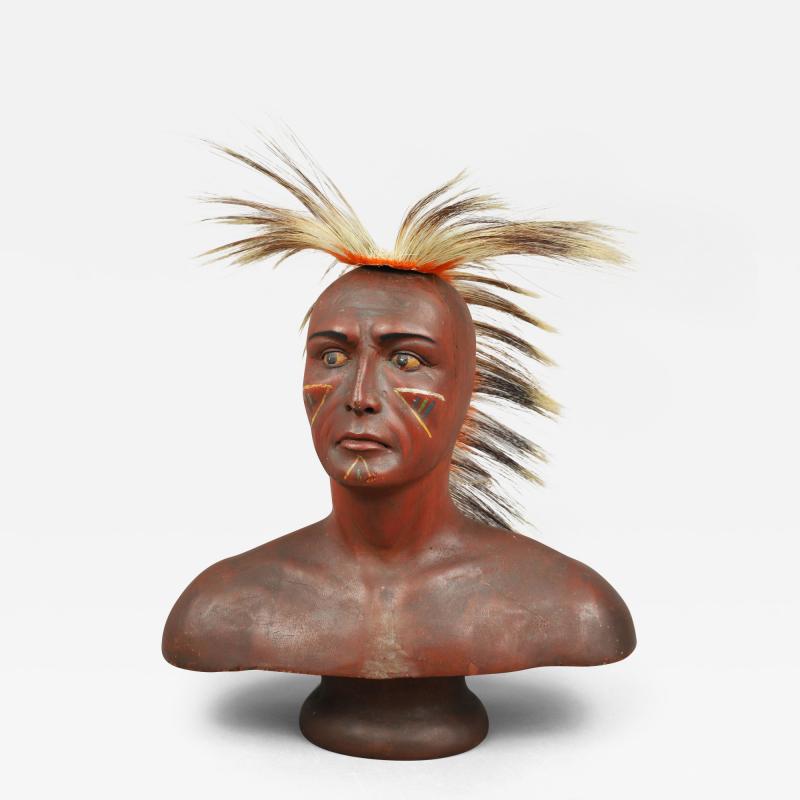 CARVED AND PAINTED BUST OF A NATIVE AMERICAN