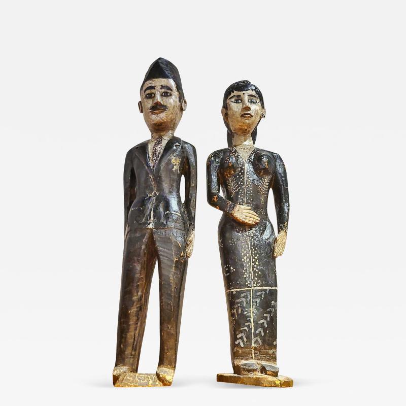 CARVED WOOD FOLK ART FIGURES OF A MAN AND WOMAN BRIDE GROOM 