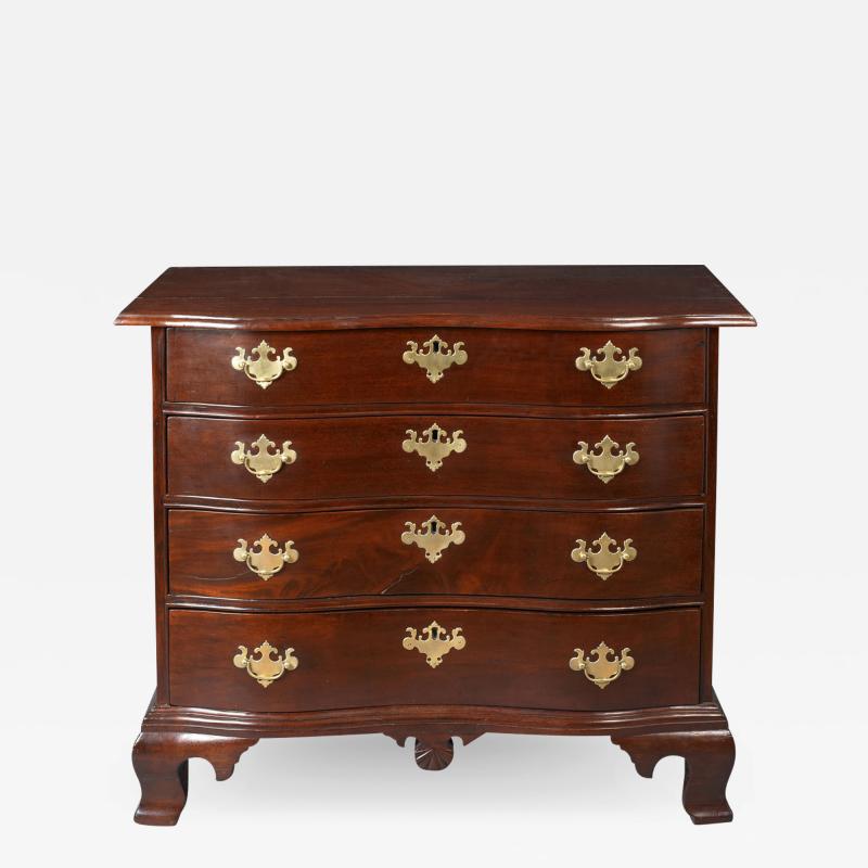 CHIPPENDALE OXBOW GRADUATED FOUR DRAWER CHEST