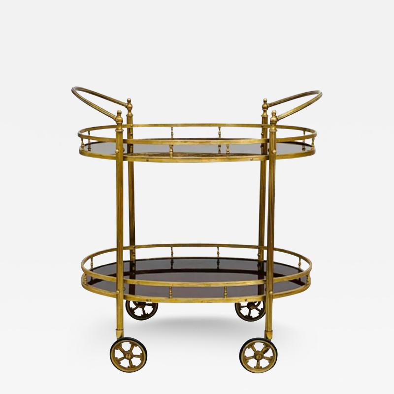 CIRCA 1960 TWO TIERED OVAL BRASS SERVING TROLLEY