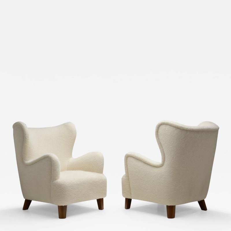 Cabinetmaker Armchairs with Wood Feet Europe first half of the 20th century