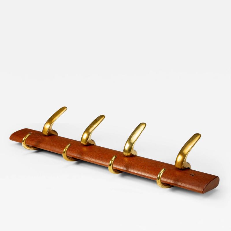 Carl Aub ck Brass and Teak Coat Hanger by Carl Aub ck for Illums Bolighus Denmark 1950s