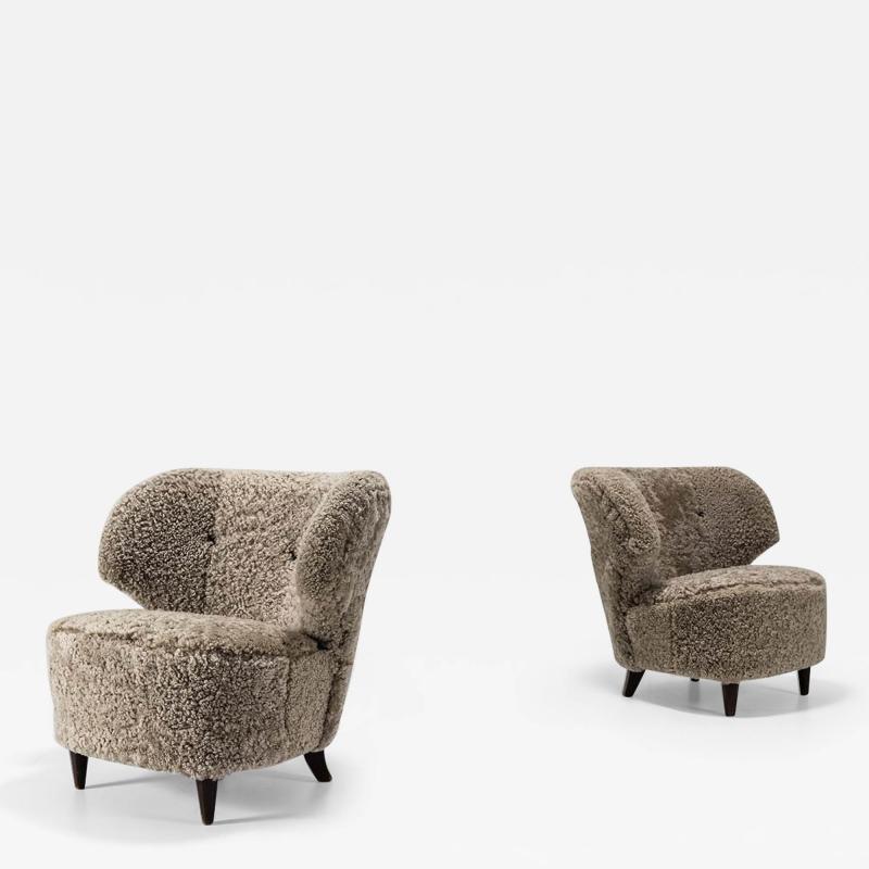 Carl Johan Boman Set of Two Carl Johan Boman Lounge Chairs in Sheepskin for Oy Boman Ab 1940s