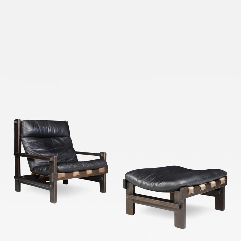 Carl Straub 1960s Carl Straub black leather lounge chair ottoman