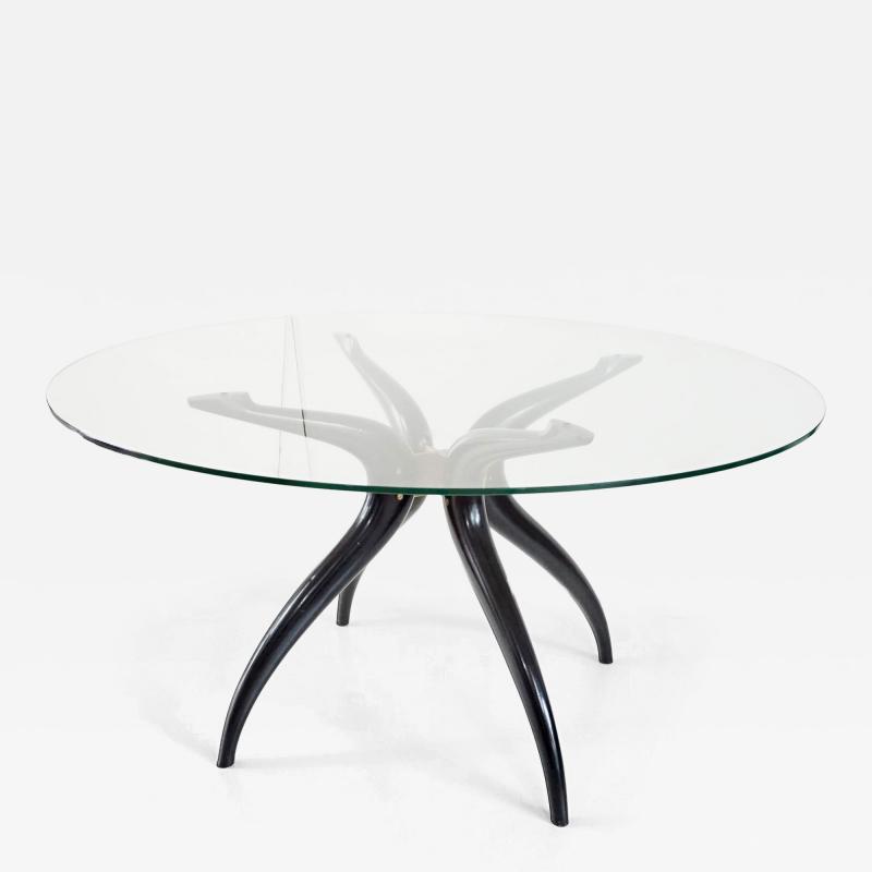 Carlo Mollino Sculptural round table follower C Mollino lacquered wood brass glass 1945