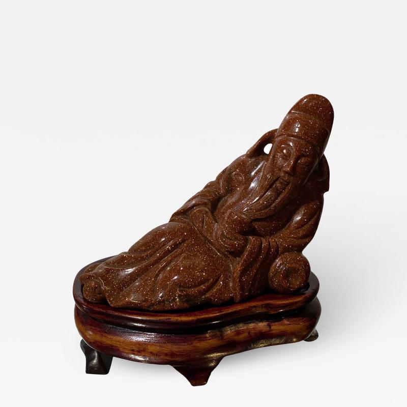 Carved Goldstone Sculpture of Recumbent Buddha