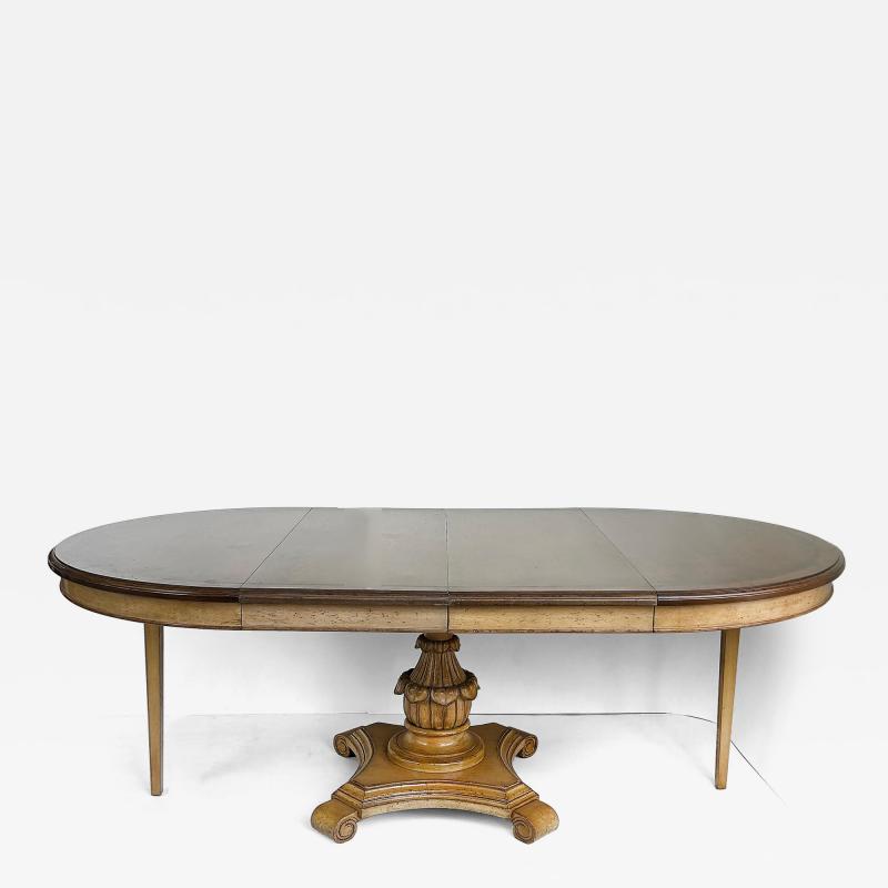 Carved Pedestal Dining Table Extends Round to Oval with Two Leaves