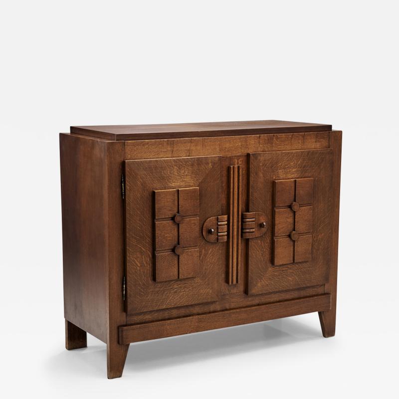 Charles Dudouyt Charles Dudouyt Oak Carved Sideboard with Brass Keys France 1940s