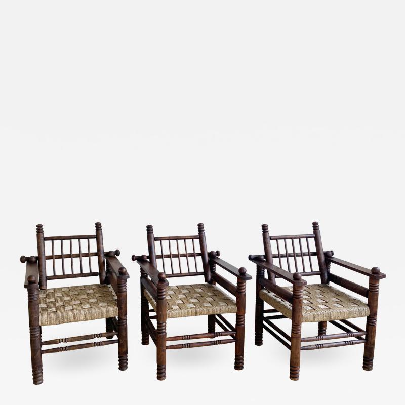 Charles Dudouyt THREE CHARLES DUDOUYT RUSH SEAT ARM CHAIRS