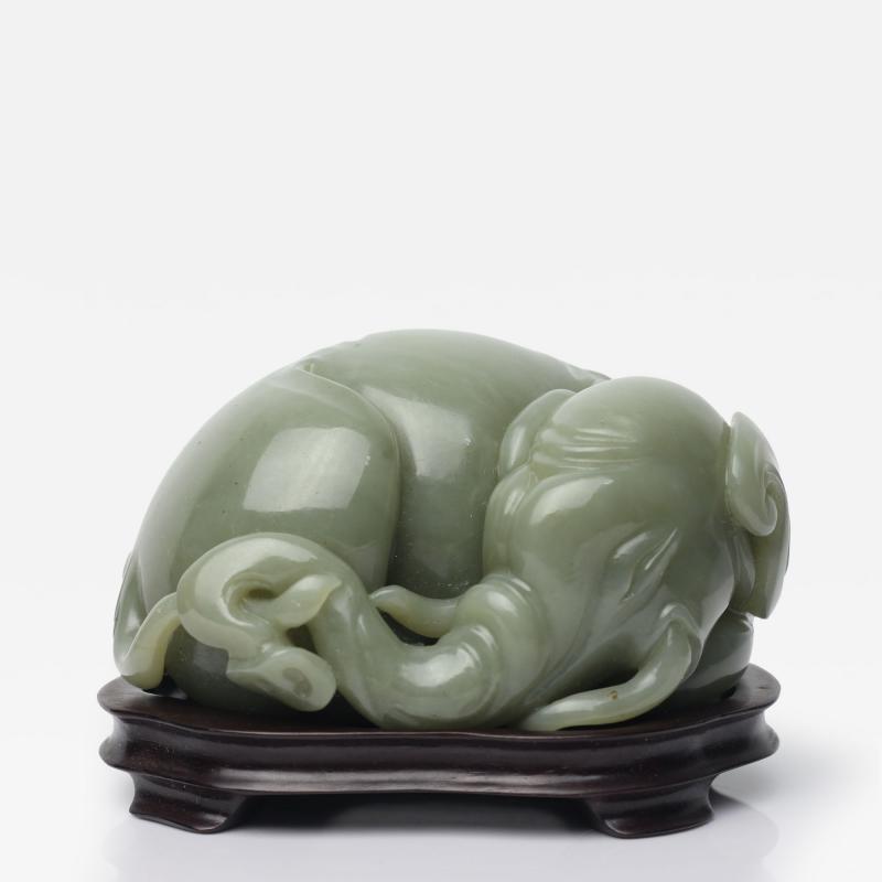 Chinese Carved Jade Elephant with its Head Turned Caressing its Tail China