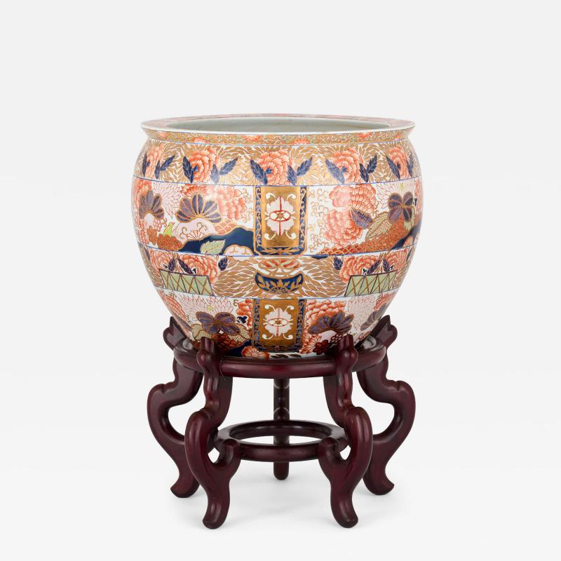 Chinese Imari porcelain planter on a wooden stand