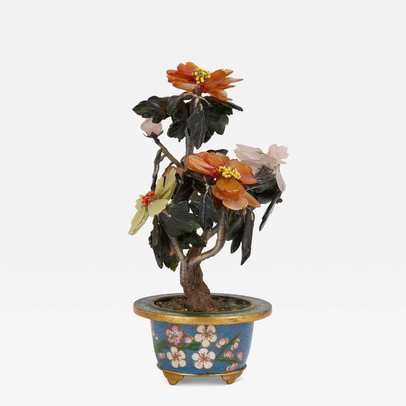 Chinese jade carnelian and quartz flower model in a cloisonn enamel planter