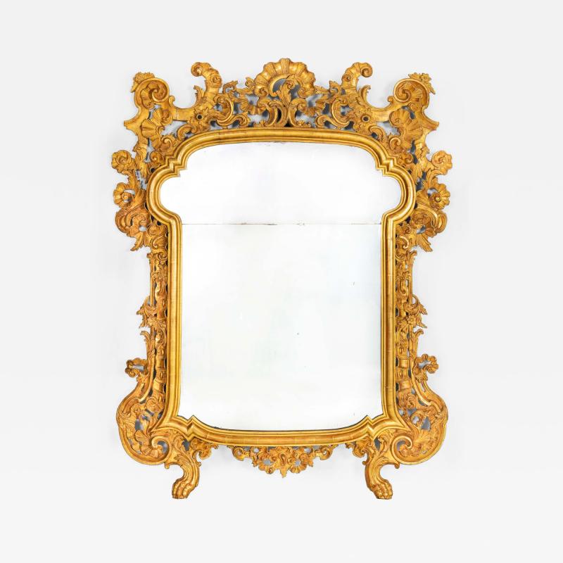 Circa 1760 Italian Rococo Giltwood Wall Mirror probably Milan 71 H x 56 W