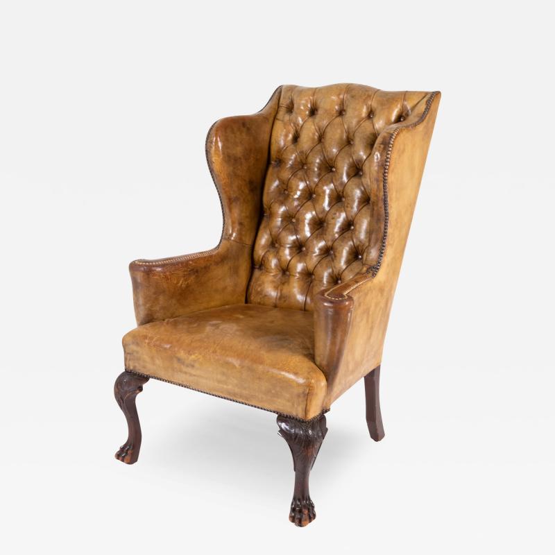 Classic Large Scale English Ochre Tufted Leather Wing Chair Circa 1900 