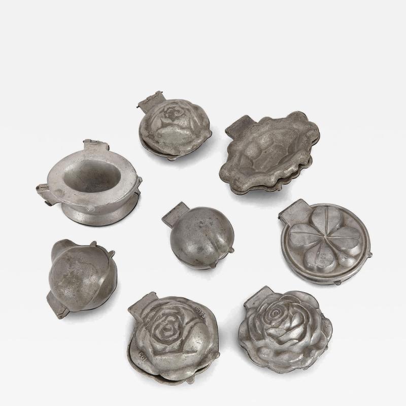 Collection of eight American pewter ice cream moulds