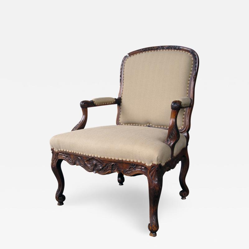 Curvaceous Danish Rococo Style Carved Walnut Open Arm Chair