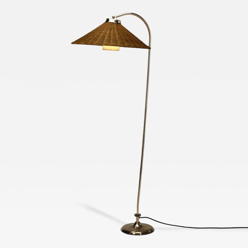 Curved Floor Lamp with Brass Stem and Rattan Shade Europe Mid 20th Century