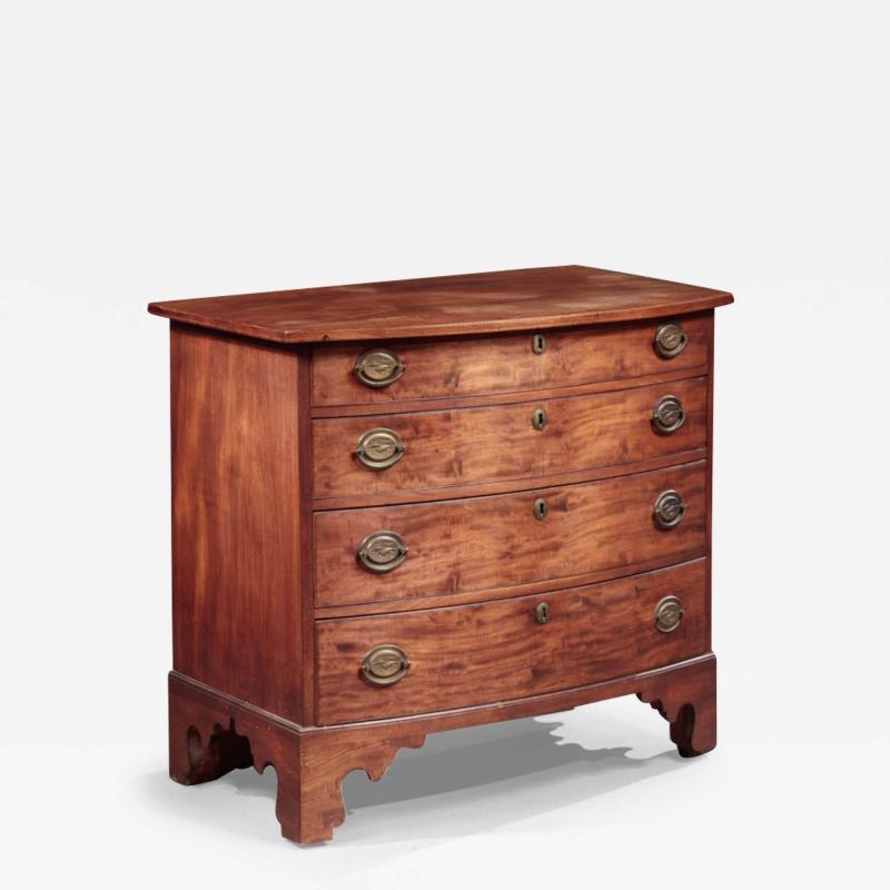 DIMINUTIVE BOWFRONT CHEST OF DRAWERS